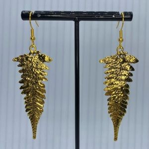 Gold fern earrings